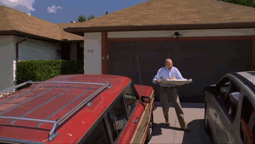 breaking bad scene in which walter white throws a pizza onto his roof