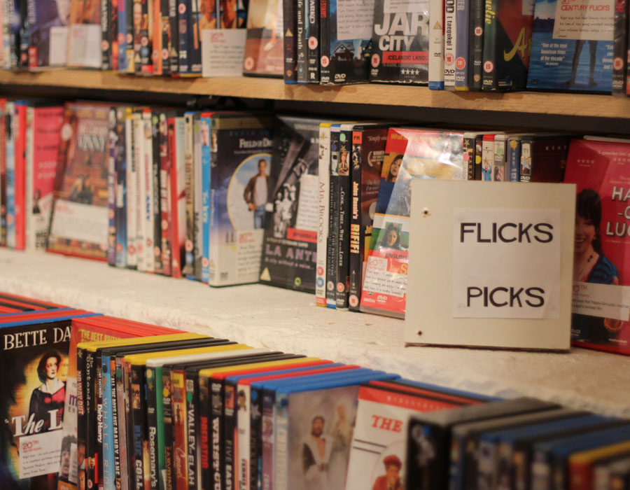 Shelf of 'Flicks Picks' - DVDs which have been reviewed by staff